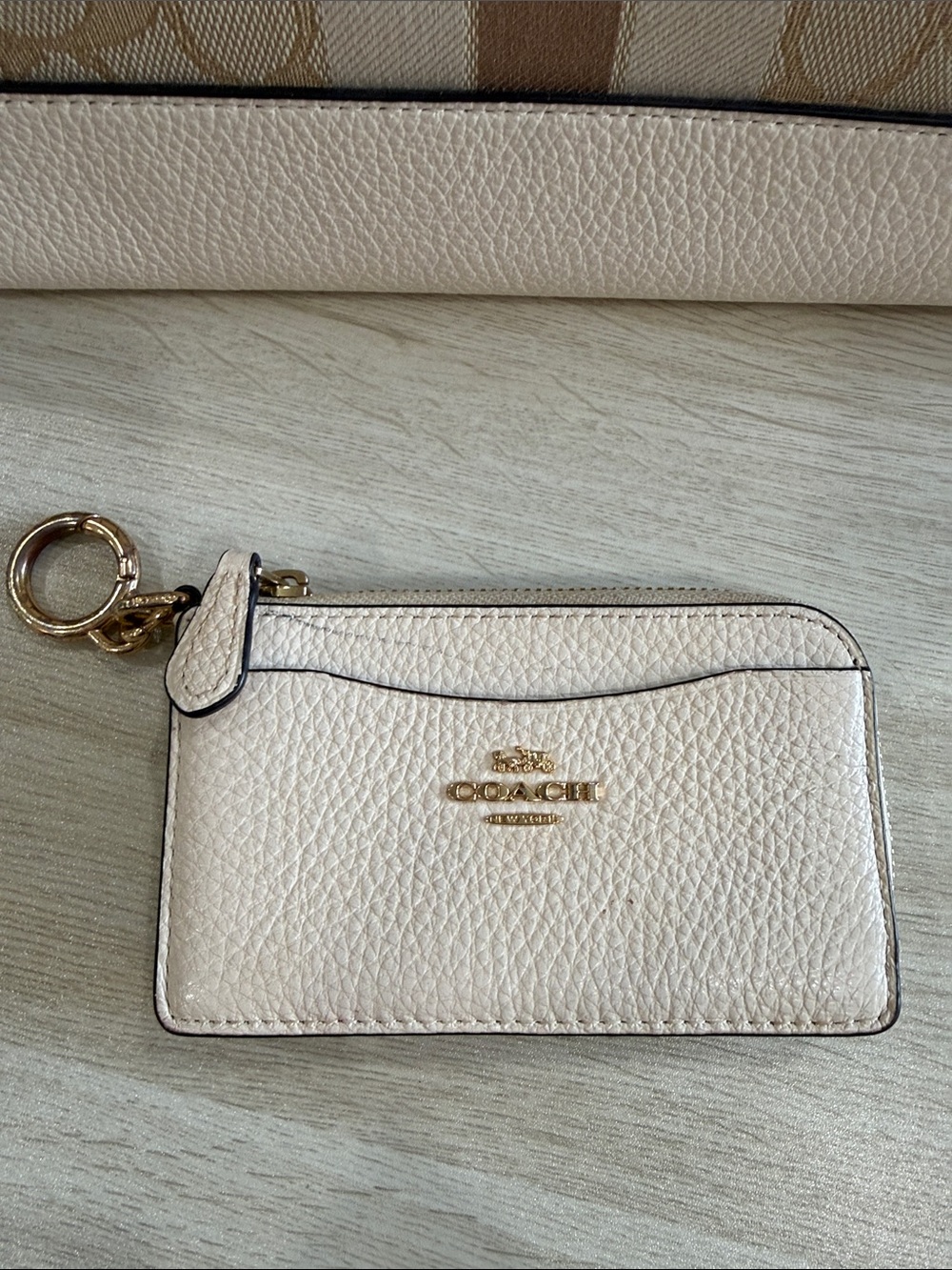 Coach Pebbled Leather Card Case Keychain in beige leather